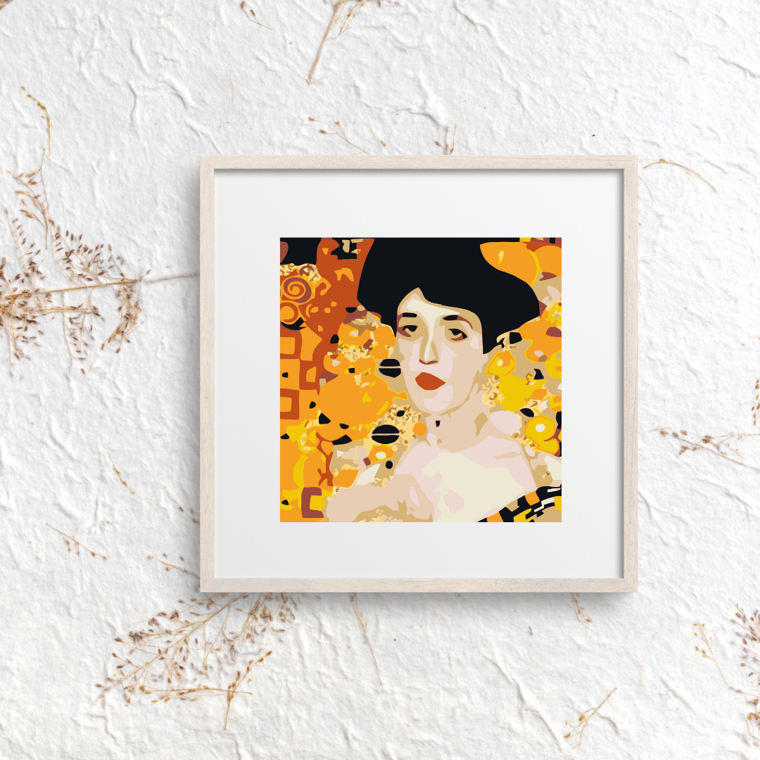 Small paint by numbers canvas framed on easel with paints
